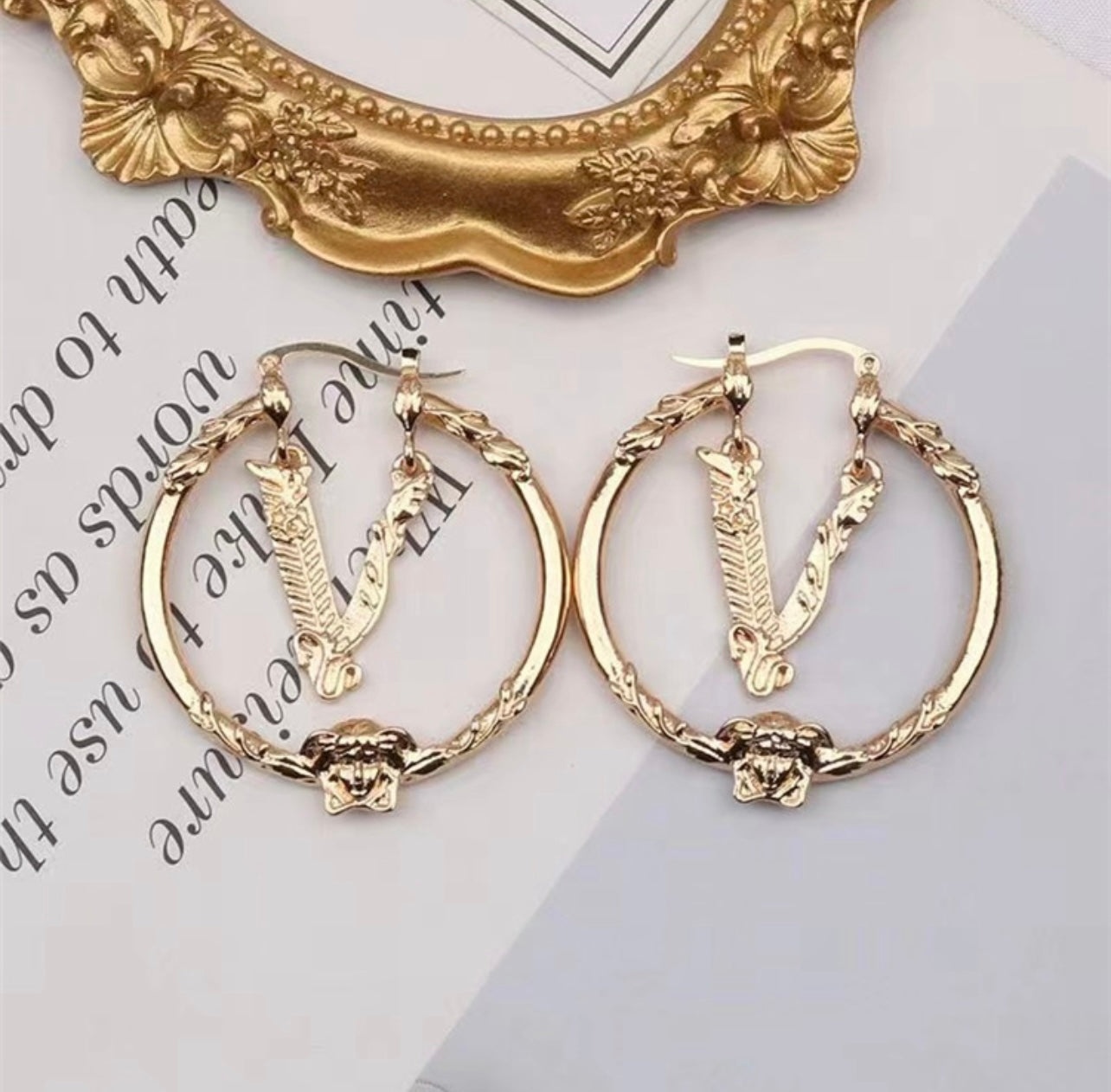V earrings